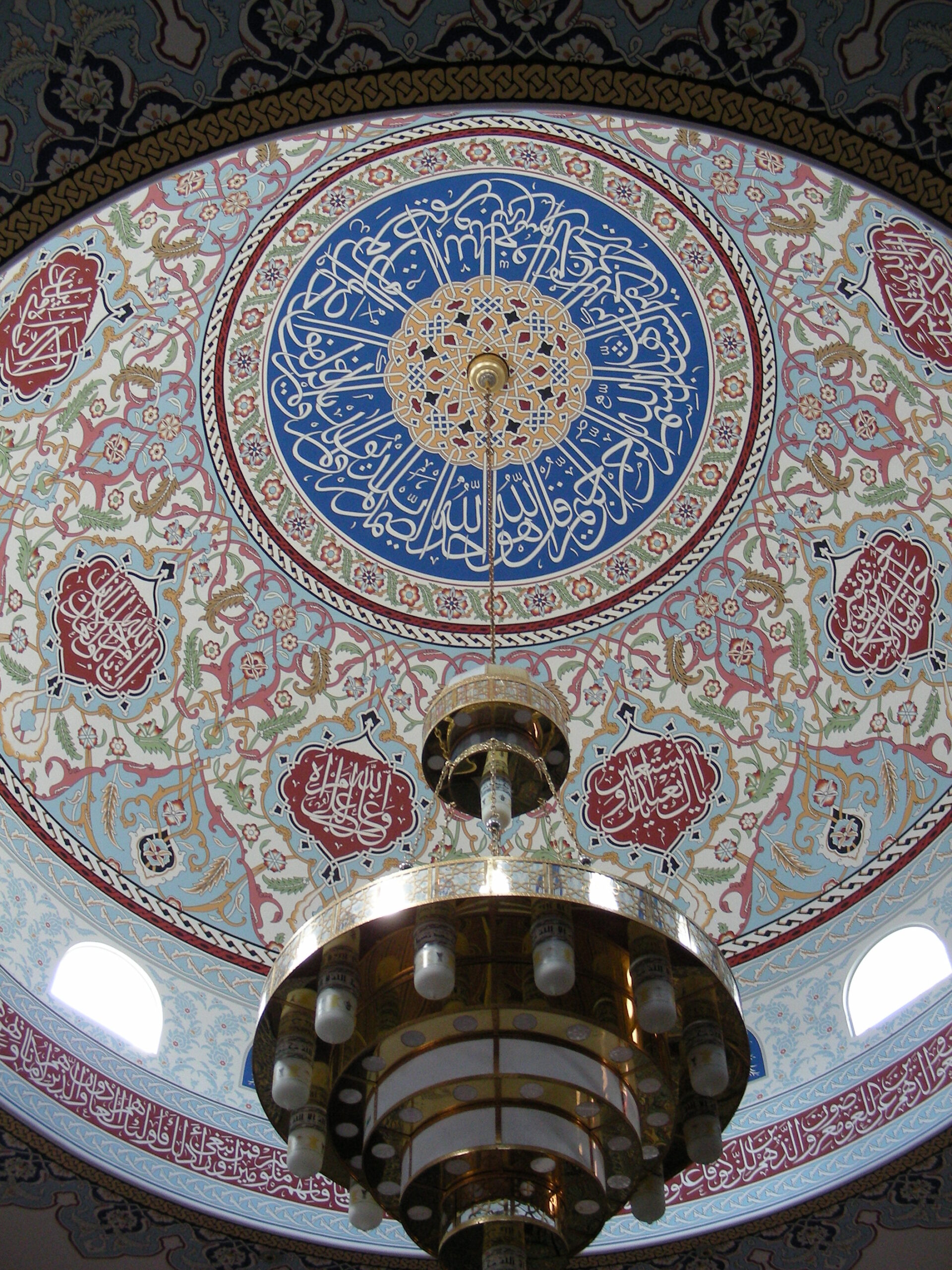 The inside of a large building with a domed ceiling
