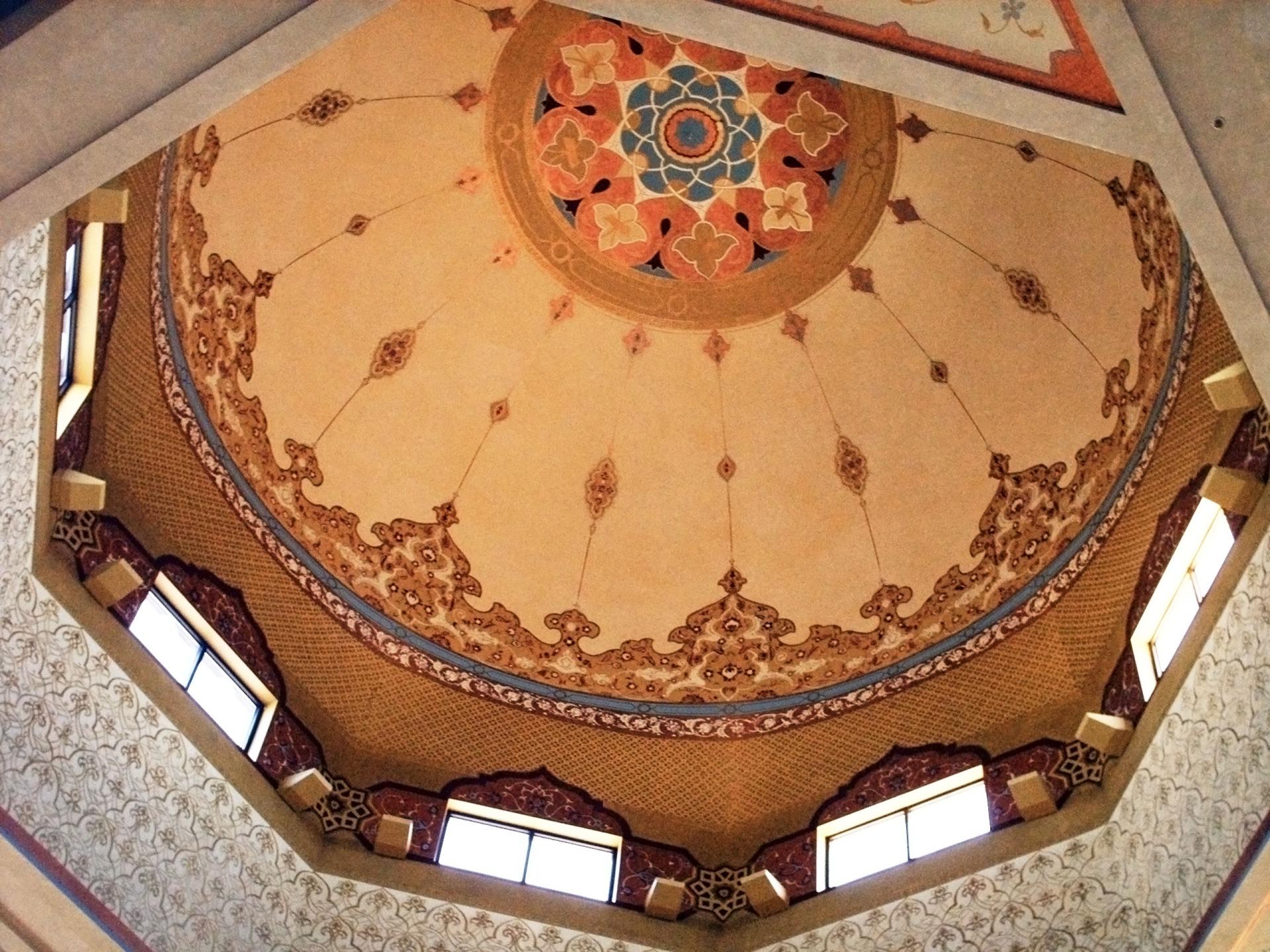 The inside of a large building with a domed ceiling